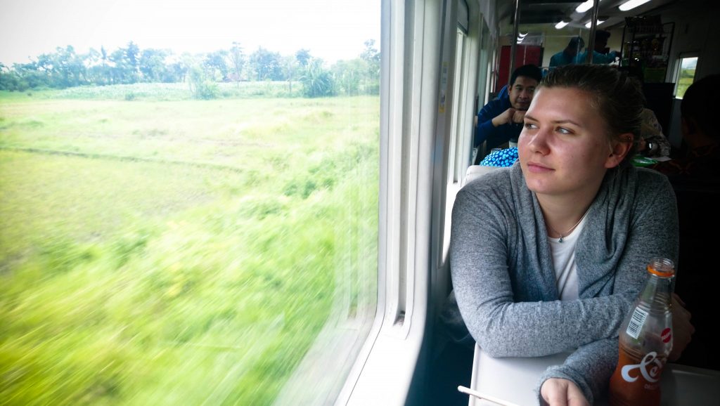 Livia enjoys the peaceful journey through the Java countryside