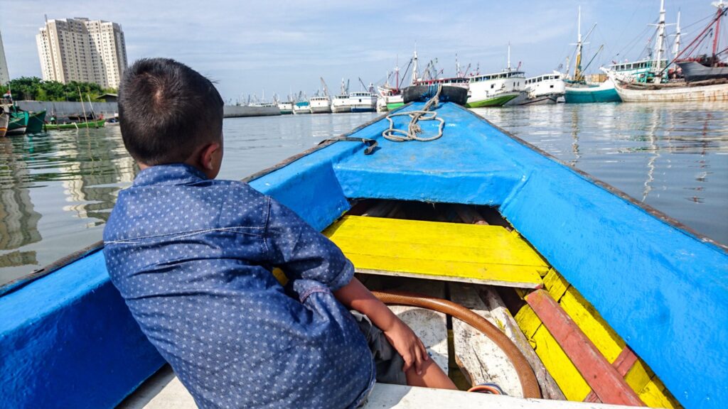 Off to the lighthouse in our wooden boat