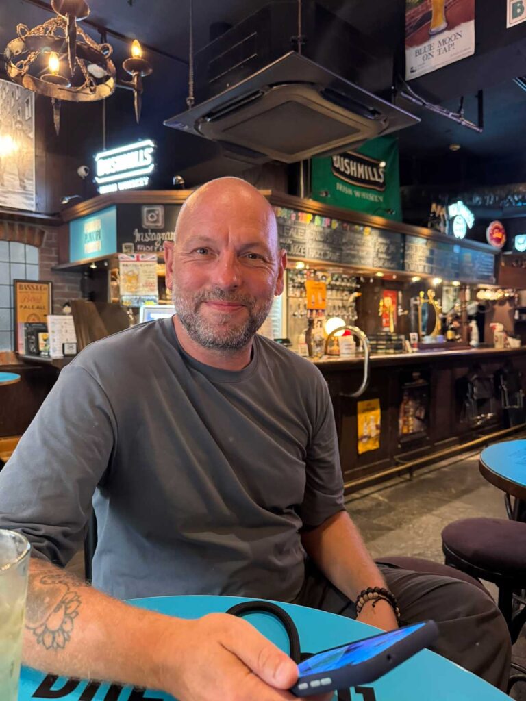 Enjoying a beer at the British Pub MORRIS' BLACK SHEEP
