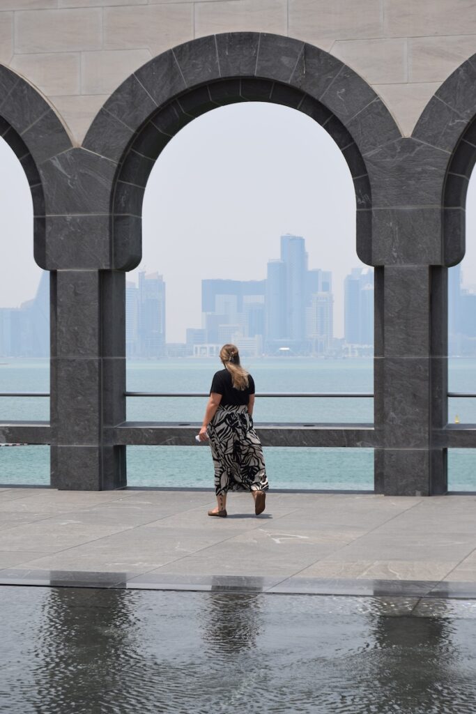 View of the Doha skyline through the arches of the Museum of Islamic Art