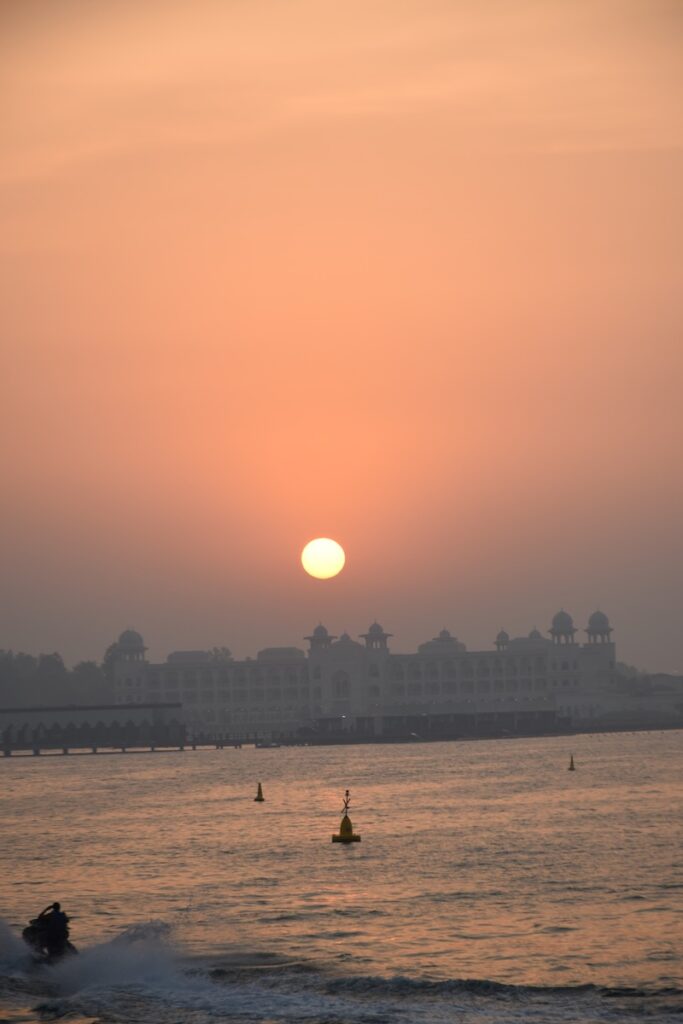 Traditional dhow boat cruise with the Doha skyline at sunset