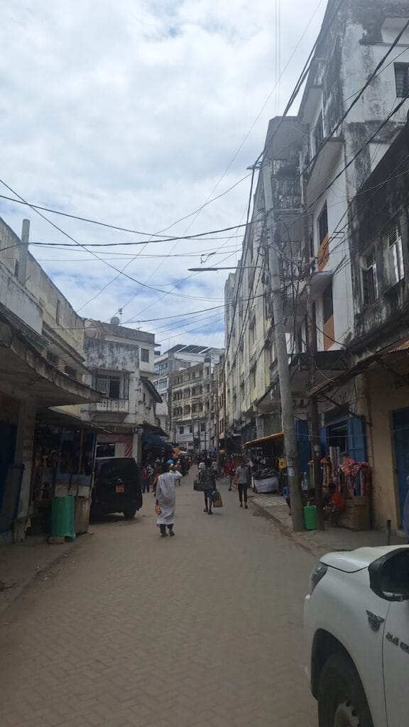Shops and street activity along Nehru Road in Mombasa