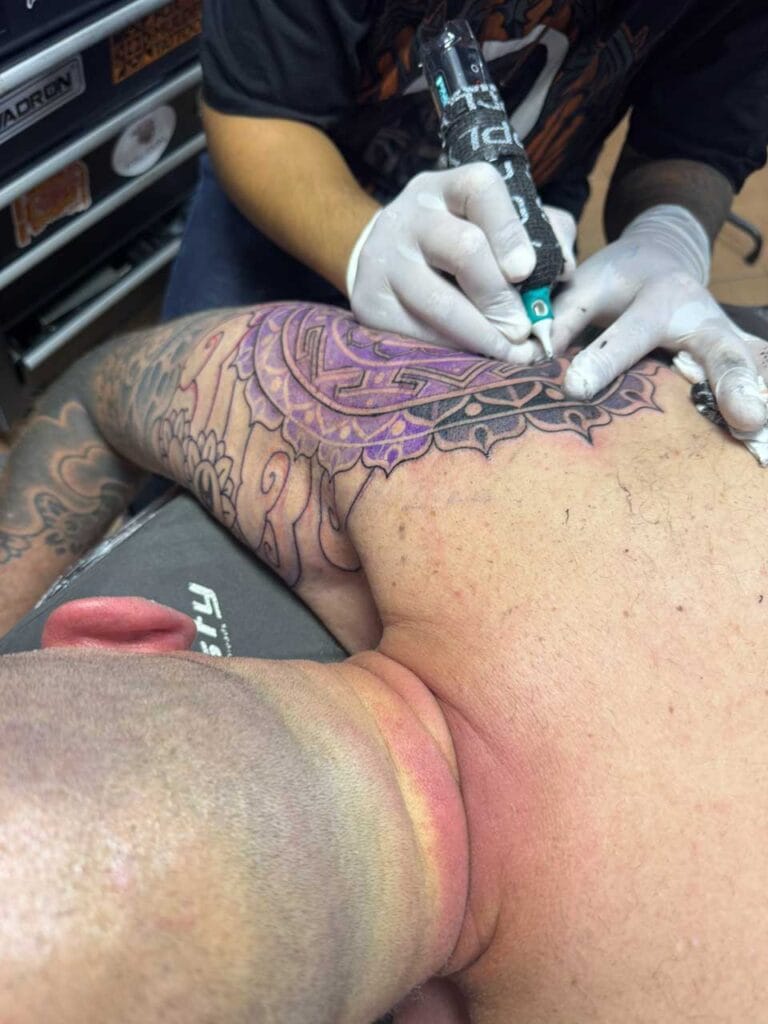Sam getting his in at Mystik Ink