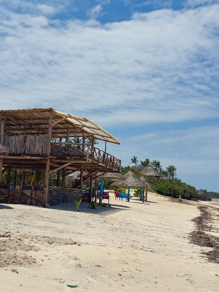 Quiet section of Bofa Beach in Kilifi, with palm trees and hardly anyone around.